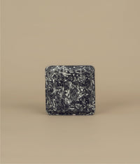 Small square naked black and white fresh shampoo bar