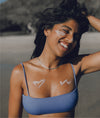 Image of girl wearing zinc sunscreen on face and chest