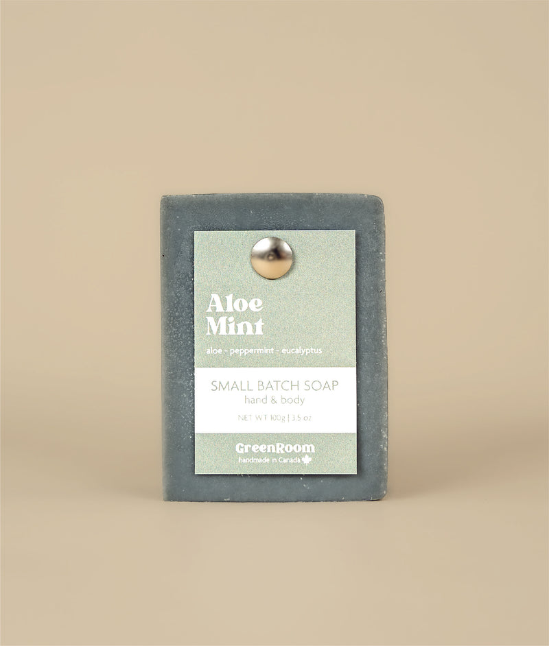 Aloe mint soap with a recycled paper tag with a metal push pin holding it