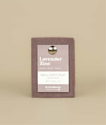 Lavender zinc soap with recycled paper tag held up by mental push pin 