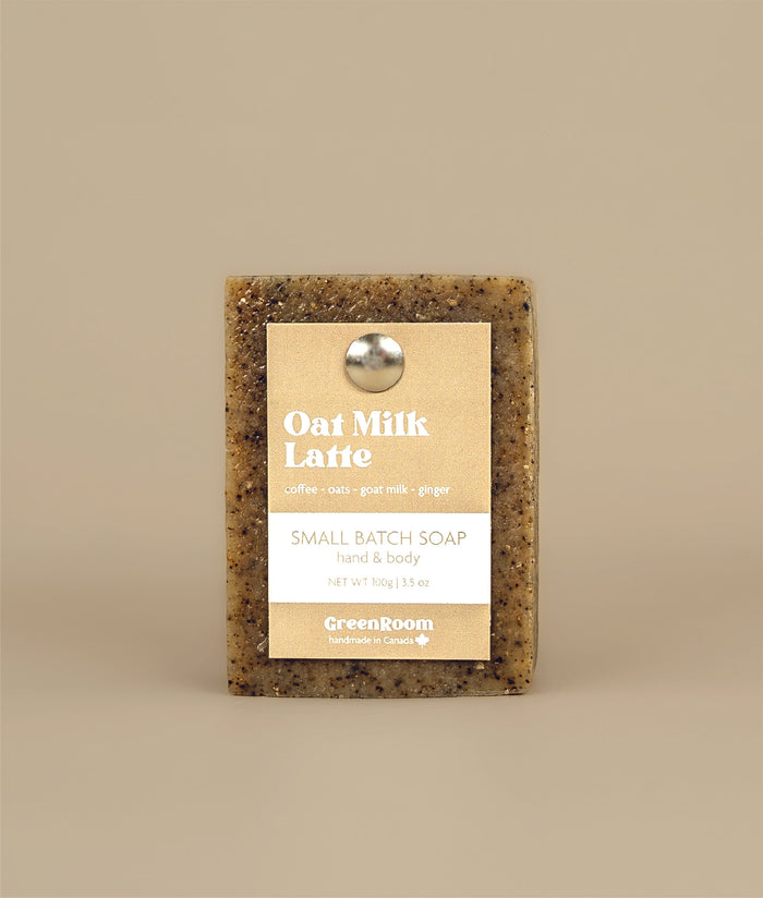 Oat milk latte soap with recycled paper brown and white tag held to the soap by a metal push pin 