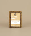 Oat milk latte soap with recycled paper brown and white tag held to the soap by a metal push pin 