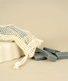 Meshed soap saver bag dumping dumping small cut offs of aloe mint soap