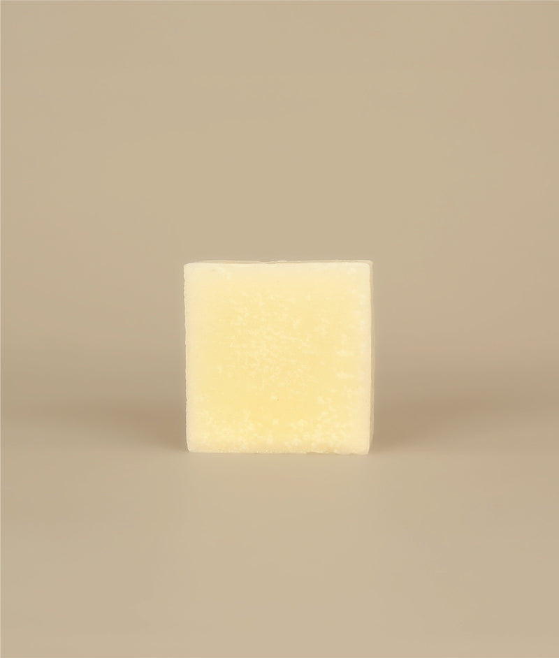 Small square naked yellow sunny silk conditioner bar