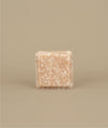 Small square naked pink shampoo bar